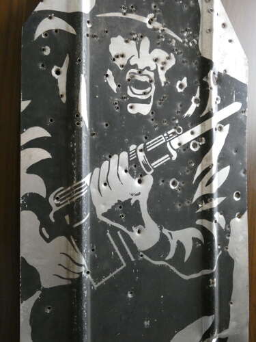 Army Target With Bullet Holes