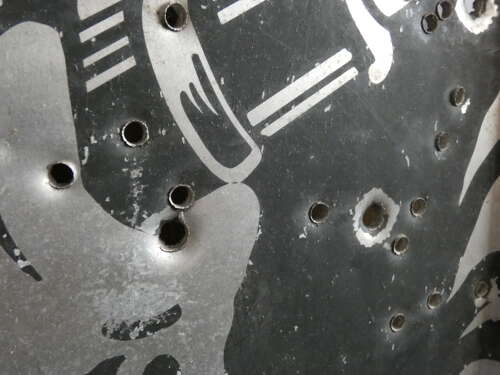 Army Target With Bullet Holes